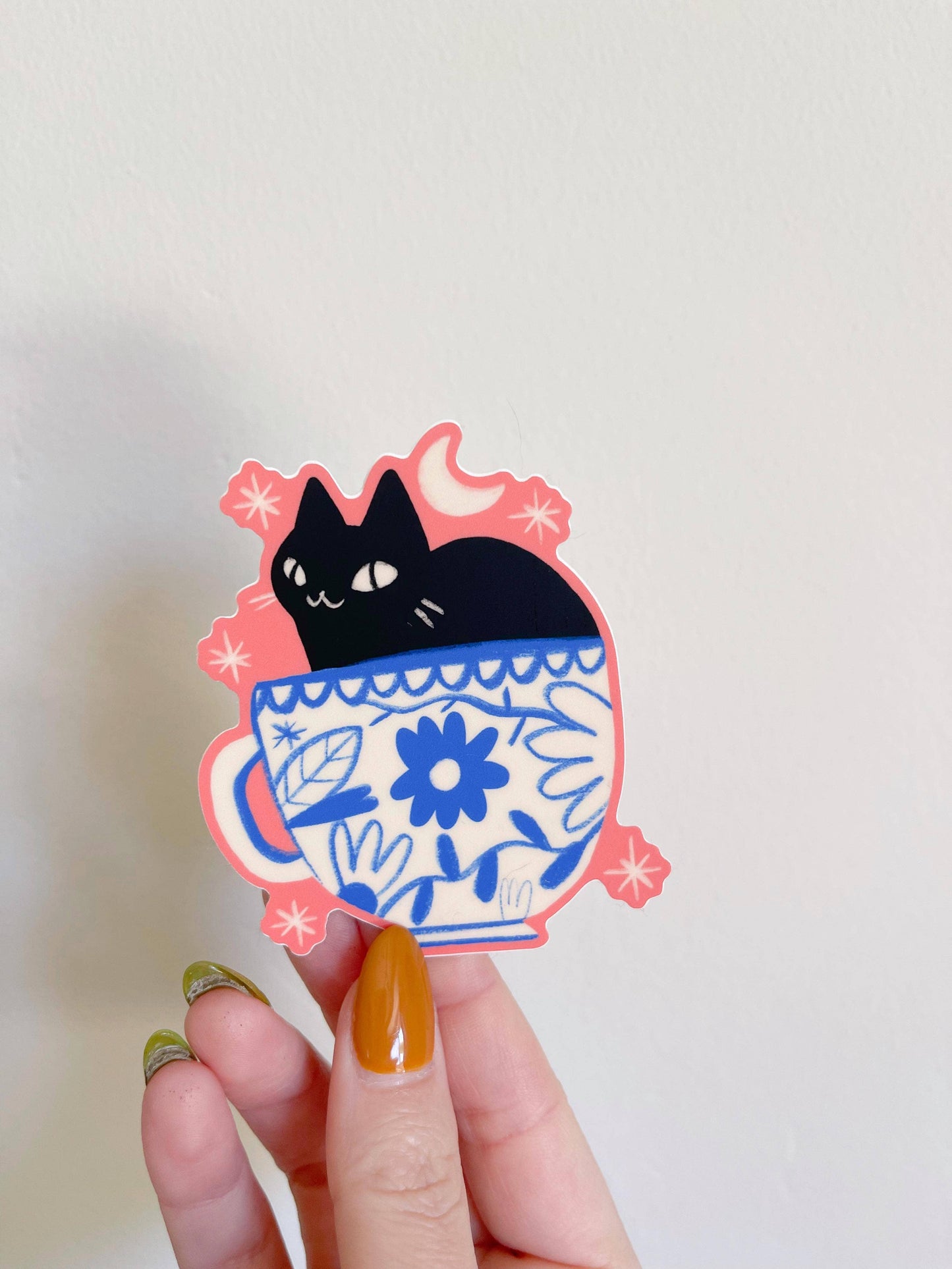 Black cat in teacup waterproof vinyl sticker
